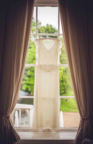 wedding dress | Teresa and Greg's Beautiful Millhouse Wedding by Lucy Nuzum | onefabday.com