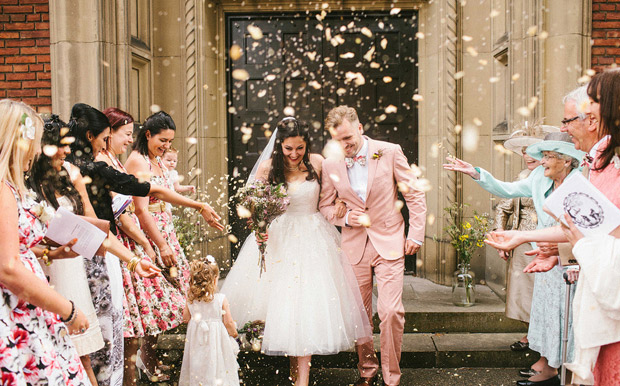 wedding couple leaving church confetti