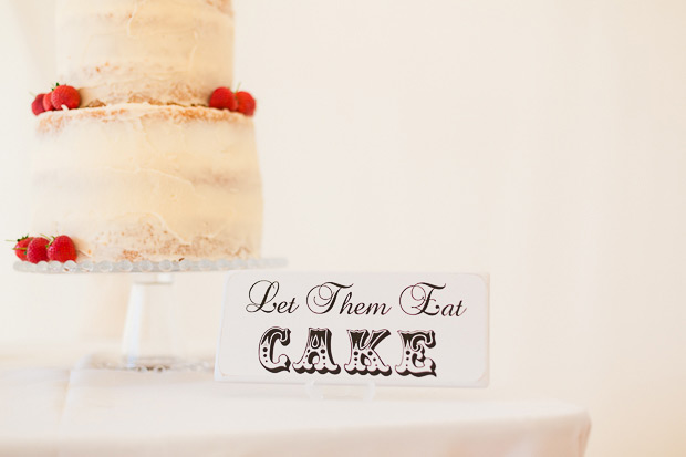 rustic naked cake with strawberries | Let them eat cake wedding sign | onefabday.com