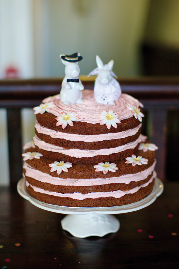 Whimsical naked cake with cute cake toppers | onefabday.com