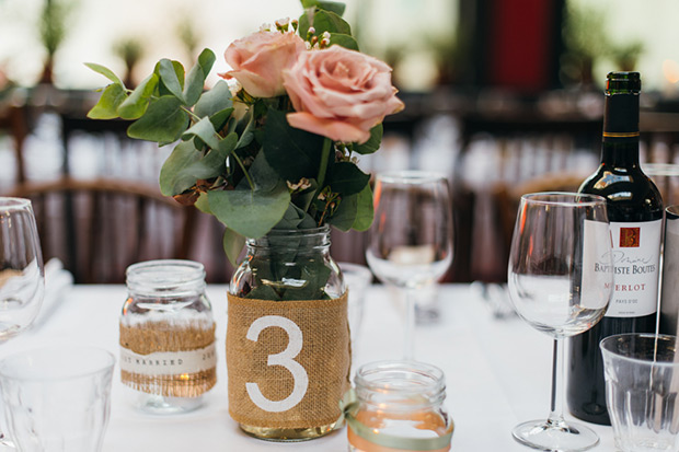 roses in jars as table number | onefabday.com