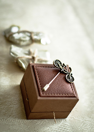 vintage bike lapel pins | Cormac and Rachel's vintage glam wedding by Joe Laverty | onefabday.com