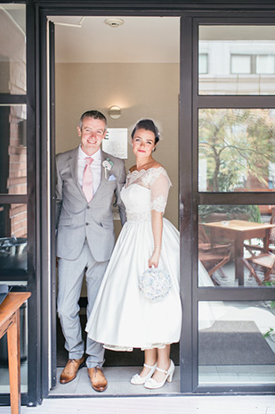 1950's style short wedding dress | Meg and Andy's DIY Central Park Wedding by Cyrience Creative Studios | onefabday.com