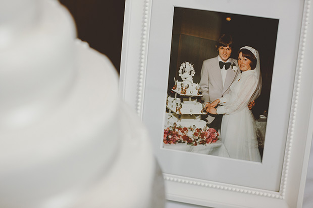 vintage wedding photos at cake table | Alissa and Gerard's Beatles and Stars wedding by Gail Kelly | onefabday.com