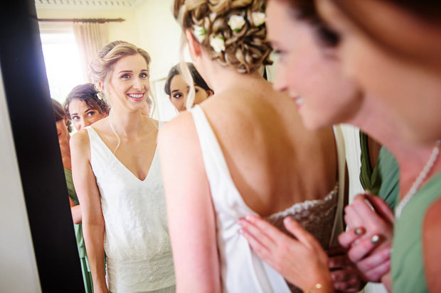 beautiful lace back wedding dress | Clio and Dave's beautiful botanical inspired wedding at Kilshane House by Give Us A Goo Photography | onefabday.com