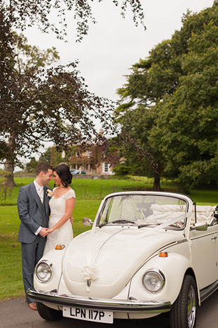 vw beetle wedding car | Paul and Ann's pretty barn wedding at Larchfield | onefabday.com