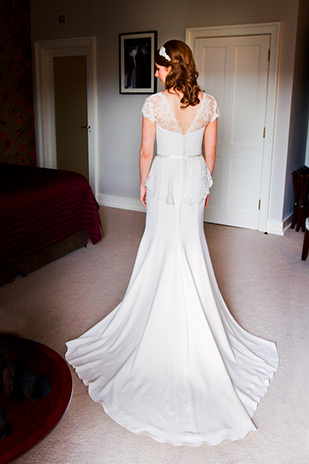 beautiful lace detail wedding dress with train | Arlene and Richard's Love is the Best Medicine inspired wedding by MOS Photography | onefabday.com