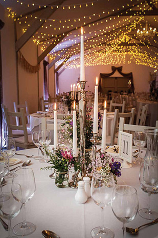 Simple wildflower centrepieces | Orlaith and Sean's Pretty Clonwilliam House Wedding by Corrine Crennan | onefabday.com