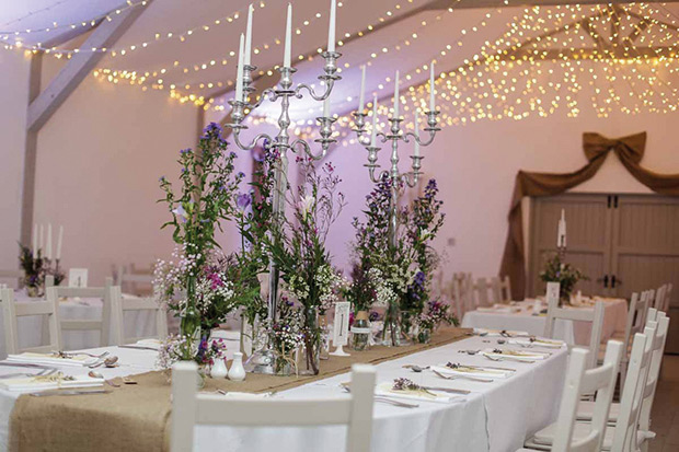 Simple wildflower centrepieces | Orlaith and Sean's Pretty Clonwilliam House Wedding by Corrine Crennan | onefabday.com