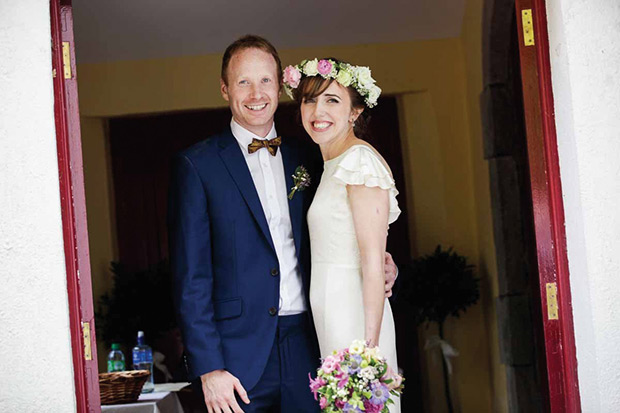 The beautiful Orlaith with a floral hair garland | Orlaith and Sean's Pretty Clonwilliam House Wedding by Corrine Crennan | onefabday.com