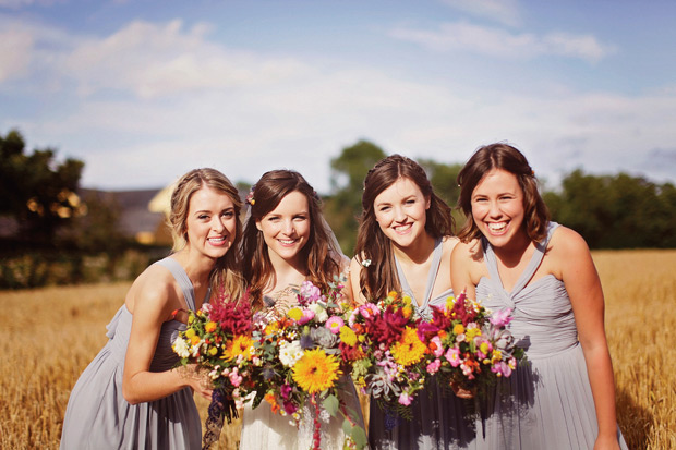 soft blue bridesmaids dresses | Richard and Louise's Colourful Tipi Wedding by Paper Windo Photography | onefabday-com.go-vip.net