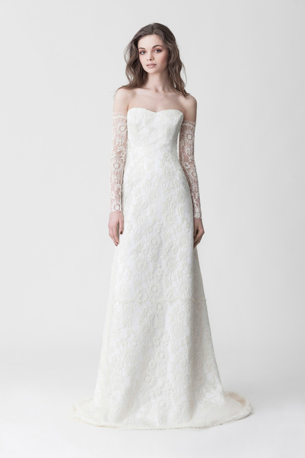 Makany Marta Midsummer Nights Dream Wedding Dresses 2015 -  Dramatic lace sleeves and simple dres overlayed with floral lace, Iman Dress | See the full collection at onefabday.com