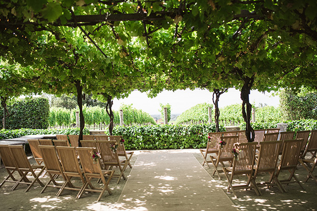 Outdoor ceremony | Maria and Mark's pretty in pink and floral wedding by Meridith Lord Photography | onefabday.com