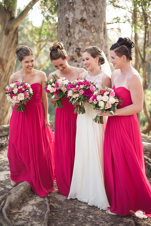 Pink bridesmaids dresses | Maria and Mark's pretty in pink and floral wedding by Meridith Lord Photography | onefabday.com