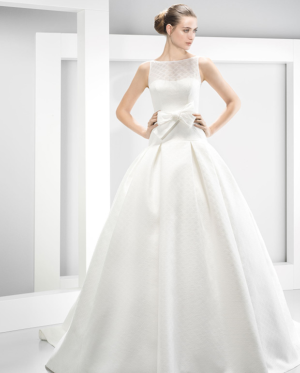 6032 wedding dress from Jesus Peiro wedding dresses Nanda Devi Collection - Full skirt wedding dress with bow detail - see the rest of the collection on onefabday.com