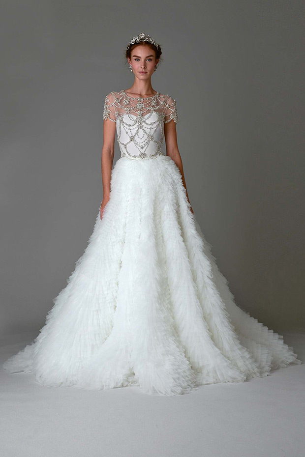 Dress 16 from Marchesa Bridal wedding dresses Fall 2016 - Delicately beaded high necked bodice, A-line gown with incredible layers, tiering down to the floor - see the rest of the collection on onefabday.com