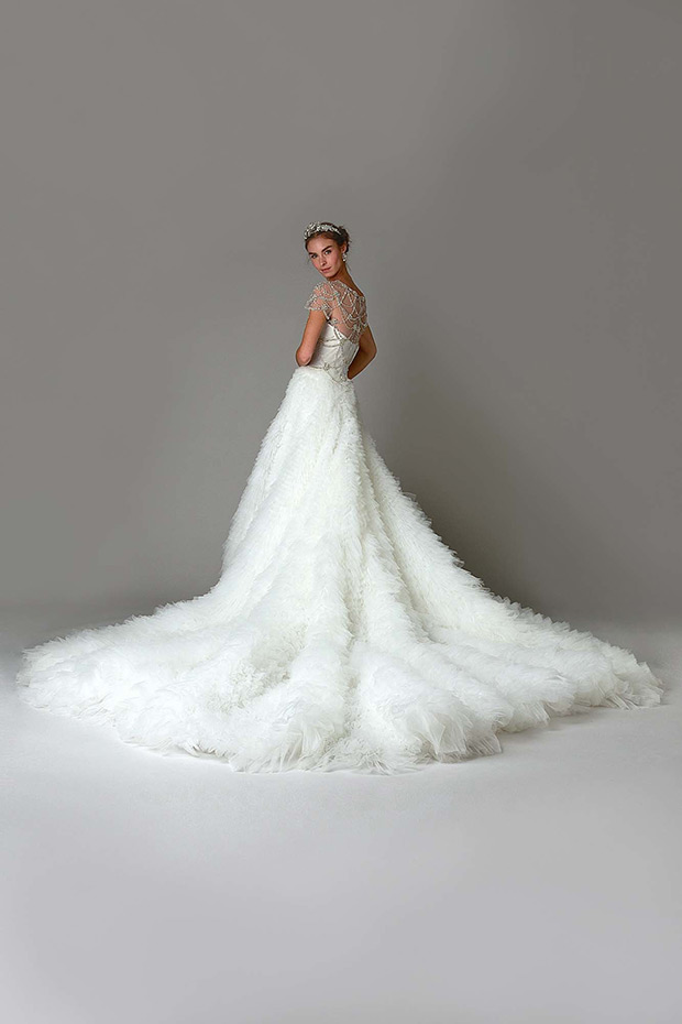 Dress 16 from Marchesa Bridal wedding dresses Fall 2016 - Delicately beaded high necked bodice, A-line gown with incredible layers, tiering down to the floor - see the rest of the collection on onefabday.com