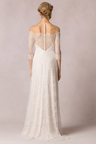 Candela from Jenny Yoo wedding dresses 2016 -This dress has an off-the-shoulder sheer illusion neckline,A-line skirt that starts at an empire waist seam,and ¾ length sheer sleeves. It also has delicate buttons for closure- see the rest of the collection on onefabday.com