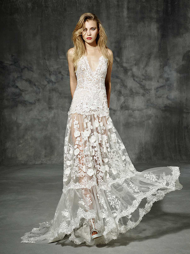 Aribau from Yolan Cris wedding dresses 2016 -The freshness of natural fibers mixed with an exquisite design turns it into the ideal beach wedding dress for a modern bride. V-neck wedding dress made of silk tulle decorated with silk flowers.-  see the rest of the collection on onefabday.com