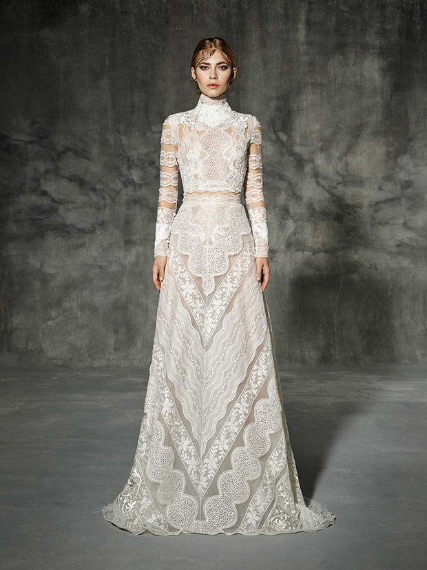 Castelao from Yolan Cris wedding dresses 2016 -Castelao is an exquisite lace overlay wedding dress. This bridal gown is high-end couture, very innovative silhuette: crop top blouse and long skirt, for a stylish bride. Endless overlapping laces and high quality silk.-  see the rest of the collection on onefabday.com