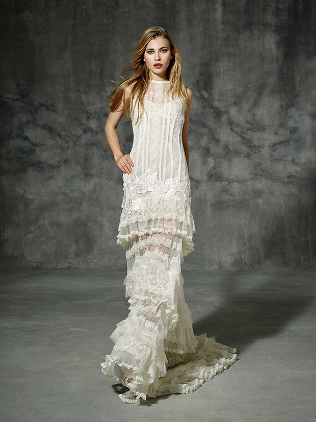 Lluria from Yolan Cris wedding dresses 2016 -It has a loose silhouette and a very modern design inspired by 70's-fashion and Ibiza style. By mixing delicate silks with rustic laces .-  see the rest of the collection on onefabday.com