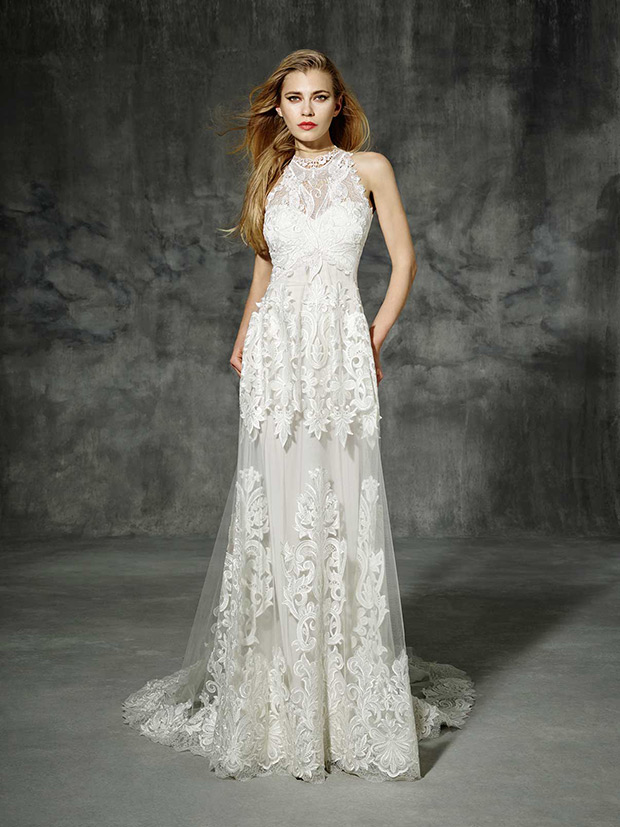 Pallars from Yoaln Cris wedding dresses 2016 -sporty neckline over a beautiful heart-shaped body neckline. Boho wedding dress made of a silk embroidered tulle with nature motifs and beautiful long bridal train.-  see the rest of the collection on onefabday.com