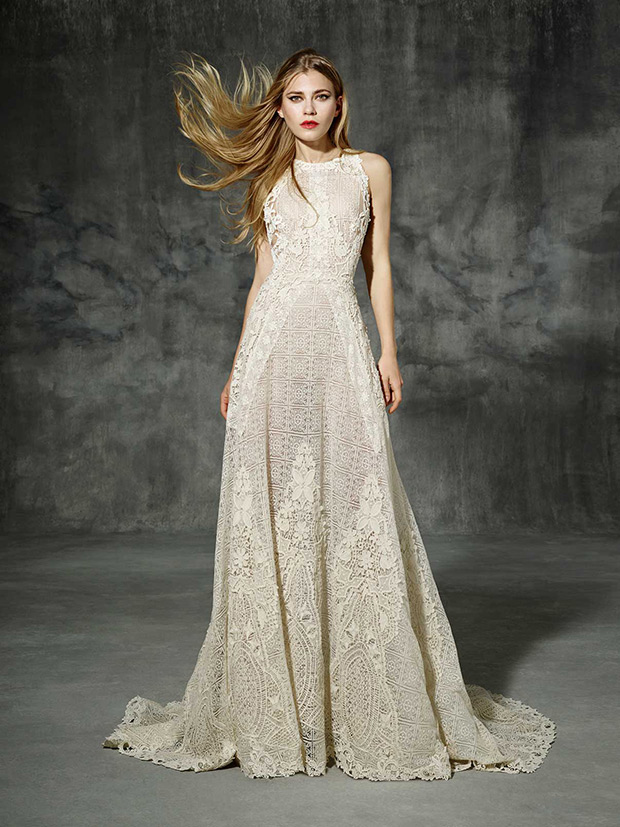 Sarria from Yolan Cris wedding dresses 2016 -Ivory lace wedding dress made of natural fibers.A princess silhouette with a flattering full volume skirt from waist, creating a modern and original wedding gown with a beautiful round back neckline.-  see the rest of the collection on onefabday.com