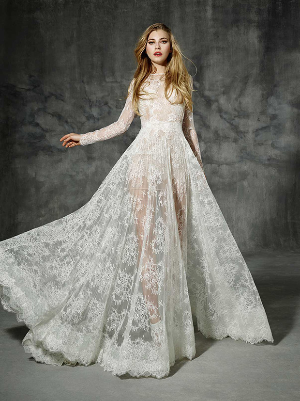 Villaroel from Yolan Cris wedding dresses 2016 -Boho lace sleeve wedding dress made of high quality French Chantilly lace. It has a tight waist silhouette that reveals a long full skirt with a lovely chapel train -  see the rest of the collection on onefabday.com