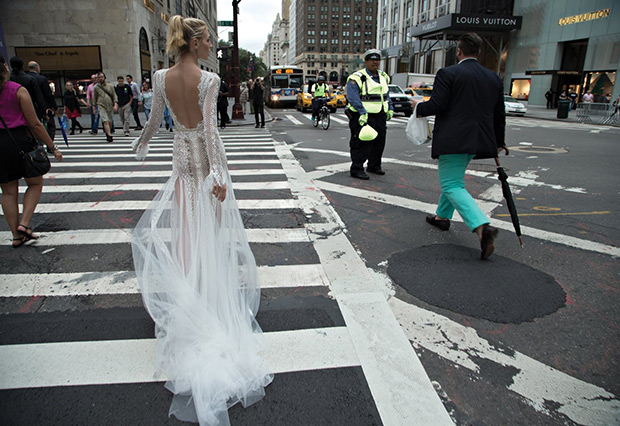 Dress 10 from Inbal Dror wedding dresses 2016 Bridal Collection - Exquisite lace detailed form fitting gown with flowing strips of sheer tulle, open low back, a low vee neck line, and flowing lace sleeves- see the rest of the collection on onefabday.com