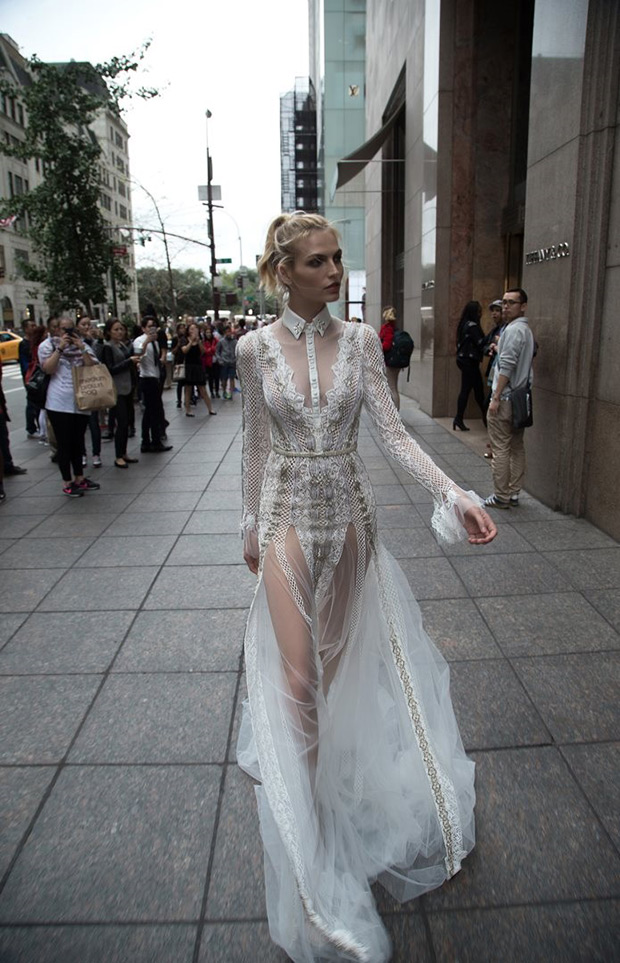 Dress 10 with insert from Inbal Dror wedding dresses 2016 Bridal Collection - Exquisite white and gold detailing form fitting gown with flowing strips of sheer tulle, open low back, and high collared insert - see the rest of the collection on onefabday.com