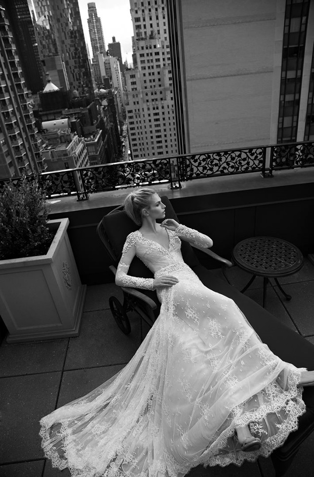 Dress 13 from Inbal Dror wedding dresses 2016 Bridal Collection - Floor length, modified A-line gown with white detailed embroidery, crystal beading, and sheer lace layers - see the rest of the collection on onefabday.com