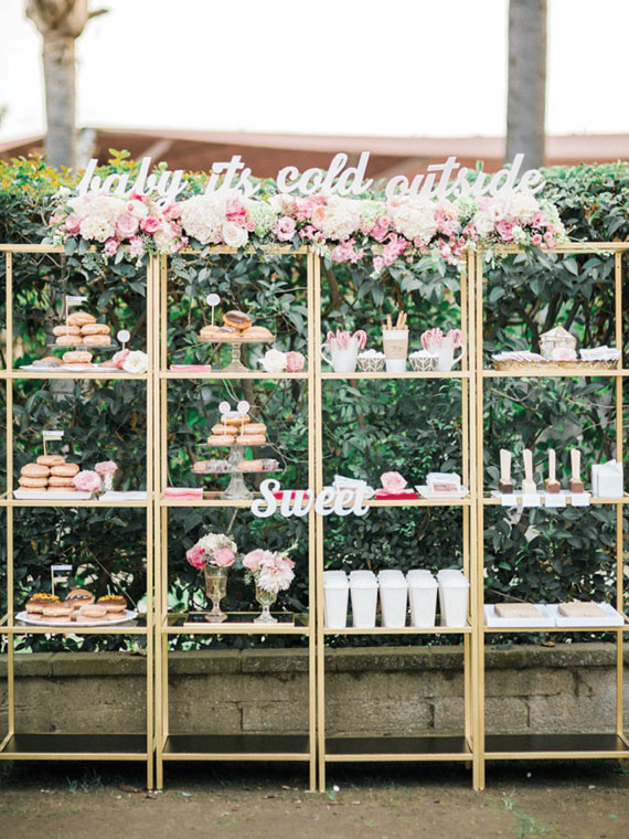 Gold standing shelves make the perfect display piece for this pretty winter themed dessert display complete with hot chocolate bar. You can recreate this look with IKEA's Vittsjö sprayed gold! onefabday.com