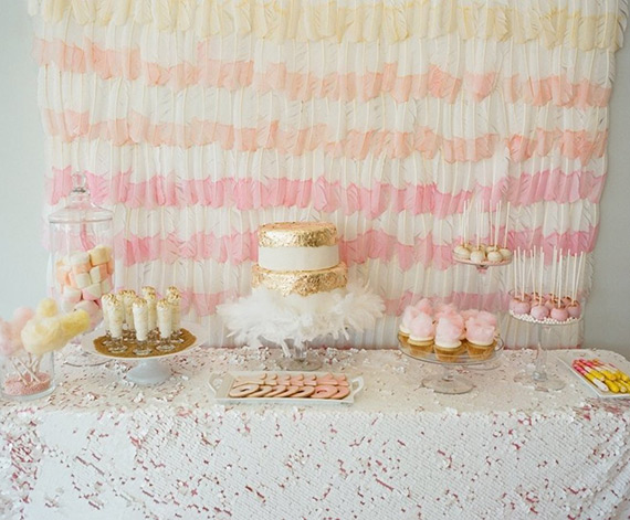 A watercolour, ombre feather backdrop frames this uber pretty wedding cake table by Girl Friday and White Peacock Styled Events // onefabday.com