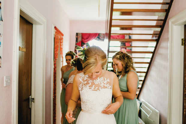 Flower-filled marquee Mussenden temple wedding in Ireland by NavyBlur Photography // onefabday.com