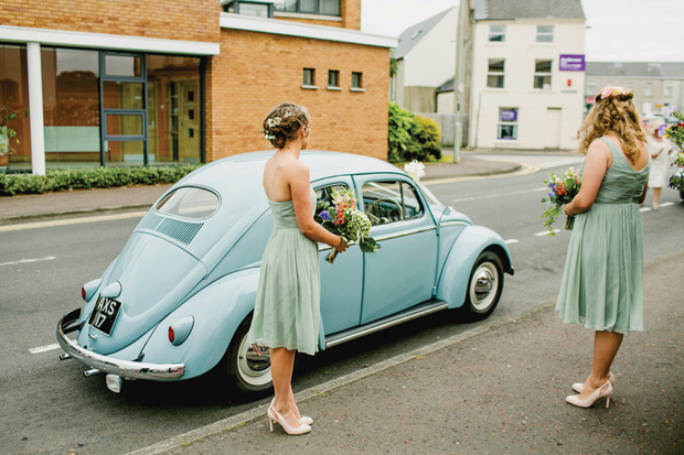 Flower-filled marquee Mussenden temple wedding in Ireland by NavyBlur Photography // onefabday.com