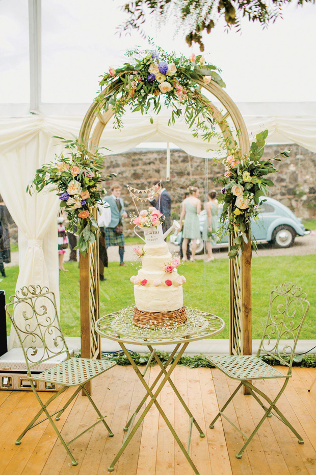 Flower-filled marquee wedding in Ireland by NavyBlur Photography // onefabday.com