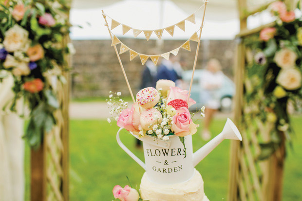 Flower-filled marquee wedding in Ireland by NavyBlur Photography // onefabday.com