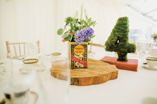 Flower-filled marquee Mussenden temple wedding in Ireland by NavyBlur Photography // onefabday.com