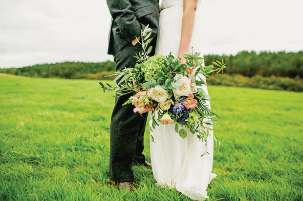 Flower-filled marquee wedding in Ireland by NavyBlur Photography // onefabday.com