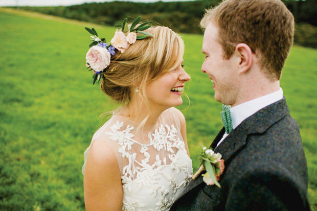 Flower-filled marquee Mussenden temple wedding in Ireland by NavyBlur Photography // onefabday.com