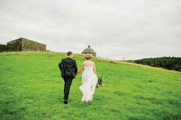 Flower-filled marquee wedding in Ireland by NavyBlur Photography // onefabday.com