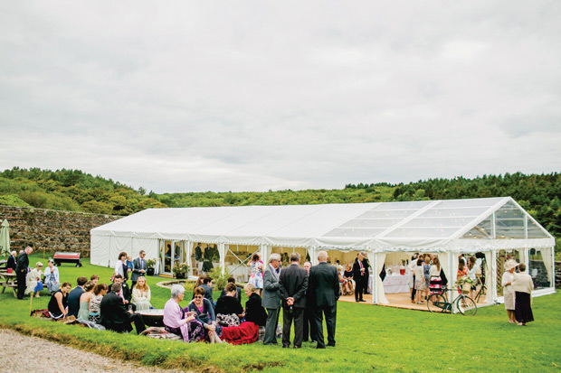 Flower-filled marquee wedding in Ireland by NavyBlur Photography // onefabday.com