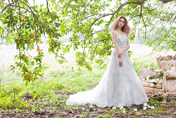 Sasha from Atelier Lyanna wedding dresses 2016 - V-neck line dress with  a full a-line skirt.Beautiful delicate floral lace pattern throughout the dress. Satin belt around the waist.-  see the rest of the collection on onefabday.com