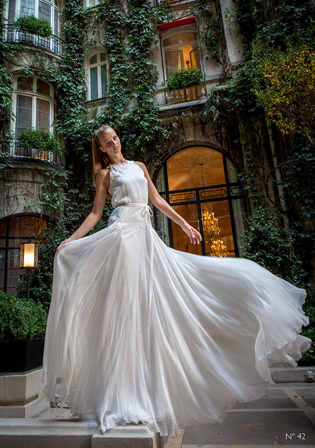 #42 from Celestina Agostino wedding dresses 2016 - High neck sleeveless dress, with a chiffon skirt. Delicate belt around the waist -  see the rest of the collection on onefabday.com