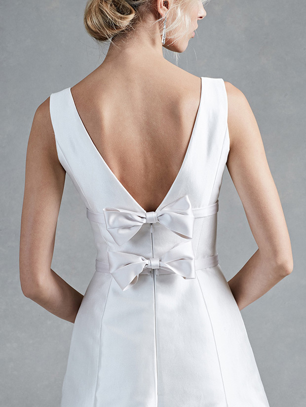 Hope from Oscar De La Renta wedding dresses 2017- White sleeveless v neck silk trumpet gown with satin bow detail - see the rest of the collection on onefabday.com