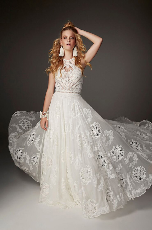 Raven from Rue de Seine wedding dresses 2016 -High neck gown with no sleeves and a full silk embroidered skirt which kicks out from the waist.Cut out detailing and circular hemline- see the rest of the collection on onefabday.com