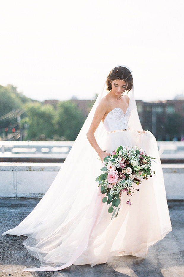 June Gown from Lady Eveyln wedding dresses 2017 - Structured bodice with a full layered tulle skirt.Gold plated stones along the bustier -  see the rest of the collection on onefabday.com