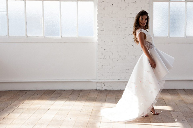 Adrian from Meryl Suissa wedding dresses 2017- Embroidered lace with cut out sheer panel, high low skirt-  see the rest of the collection on onefabday.com