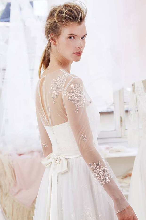 Artemis from Atelier Emelia wedding dresses 2018 - Strapless bodice with illusion sheer neck and long sleeves. Delicate embroidery throughout. Long skirt with silk ribbon.  -  see the rest of the collection on onefabday.com