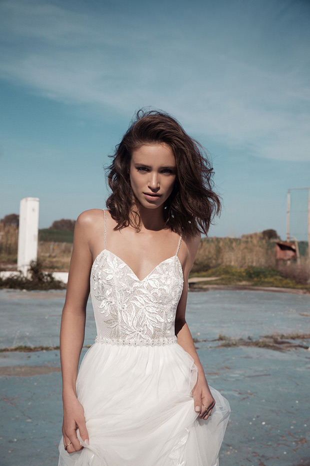 Carrie from Flora wedding dresses 2018 - v-neck line with shoe string straps, embellished bodice with pearl detailing.Natural waist line with chiffon skirt  -  see the rest of the collection on onefabday.com